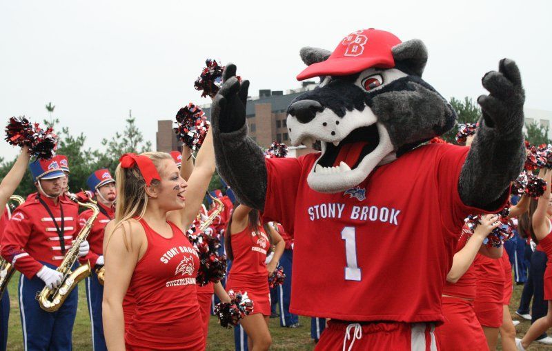 Wolfie helps Stony Brook cheerleaders pep up the crowd at the Wolfstock BBQ on September 24, 2011. Photo by Kelly Pivarnik.