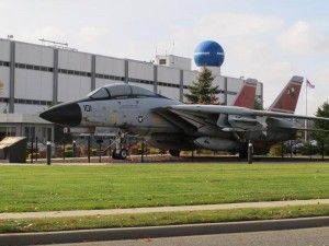 This photo taken Tuesday, Nov. 11, 2014, shows a model of a fighter jet outside former Grumman Corp. plant in Bethpage, N.Y. Officials have been working for years to clean up a plume of contaminated water emanating from the Long Island facility. (AP PHOTO/FRANK ELTMAN)