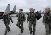 Four F-15 Eagle pilots from the 3rd Wing walk to their respective jets at Elmendorf Air Force Base, Alaska, on Wednesday, July 5, for the fini flight of Maj. Andrea Misener (far left). To her right are Capt. Jammie Jamieson, Maj. Carey Jones and Capt. Samantha Weeks. (U.S. Air Force photo/Tech. Sgt. Keith Brown)