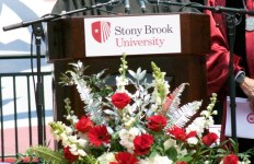 Sr. Sanaa Nadim of the SBU Interfaith Center gives the Invocation at the 2016 commencement. Photo by Kayla Shults.